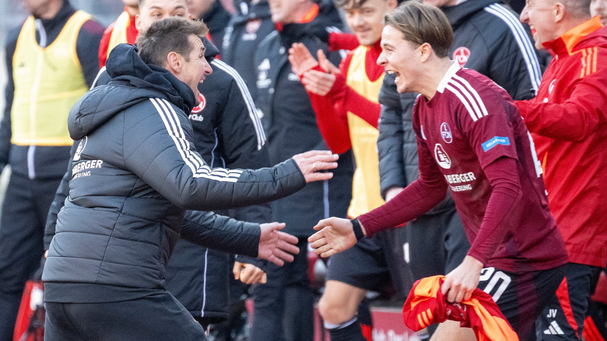 Miroslav Klose (links) und Caspar Jander (rechts) jubeln.