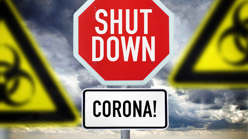 Schild mit der Aufschrift Shutdown und Biogefährdungsschilder