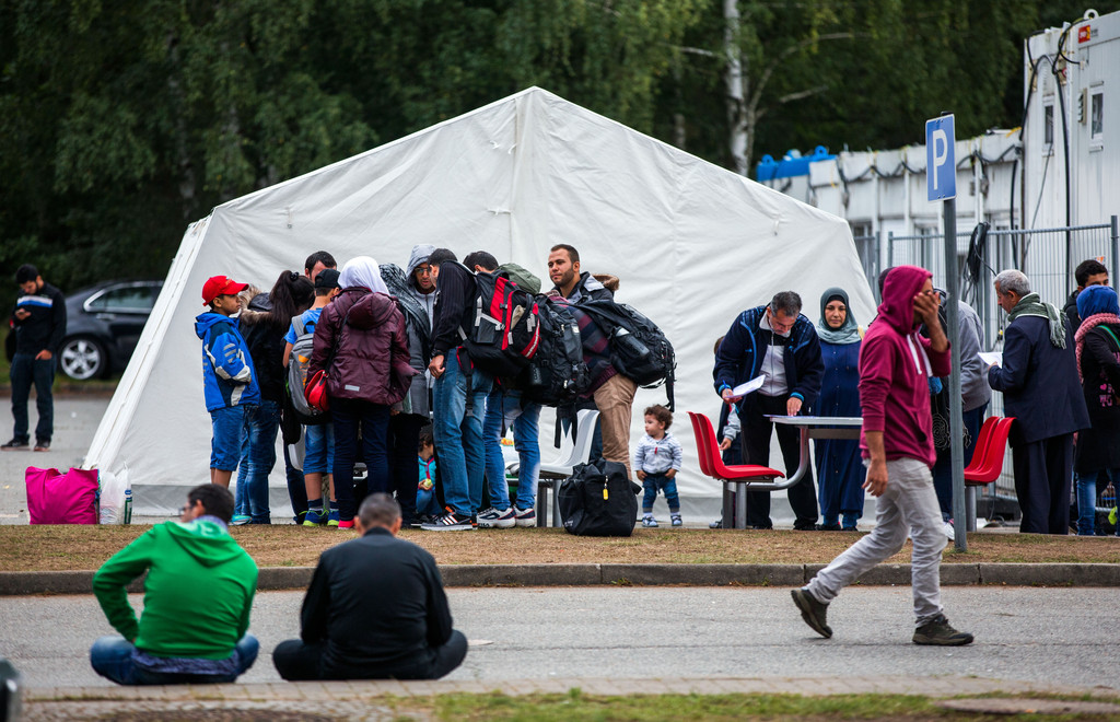 Flüchtlinge nach der Ankunft in Deutschland im September 2015 (Symbolbild)