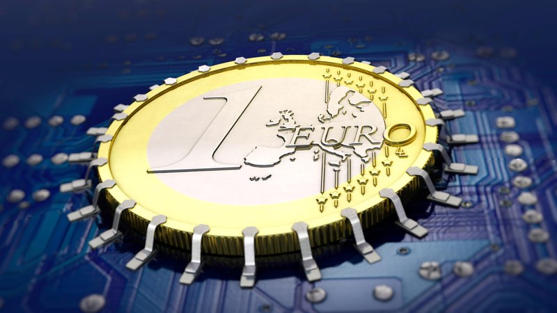 1-Euro-Münze auf einer Computerplatine
