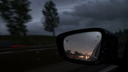 06.05.2024, München: Ein Auto ist während heftigen Regens in einem Rückspiegel auf der Autobahn 93 (A93) zu sehen.  | Bild:dpa-Bildfunk/Karl-Josef Hildenbrand