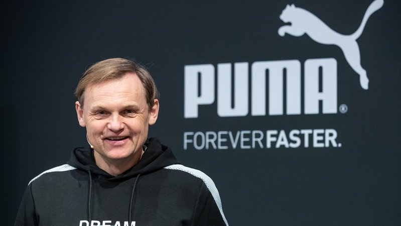 Björn Gulden vor dem Puma-Logo