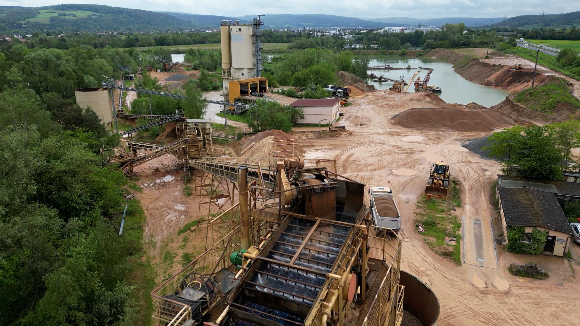 Salatschleuder-Kieswerk-Wasserschlauch
