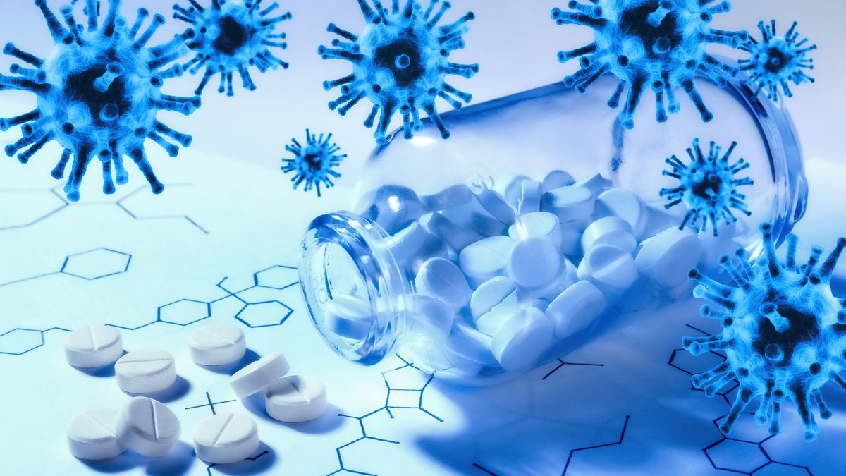 Symbolbild: Tabletten mit Strukturformeln und Viren