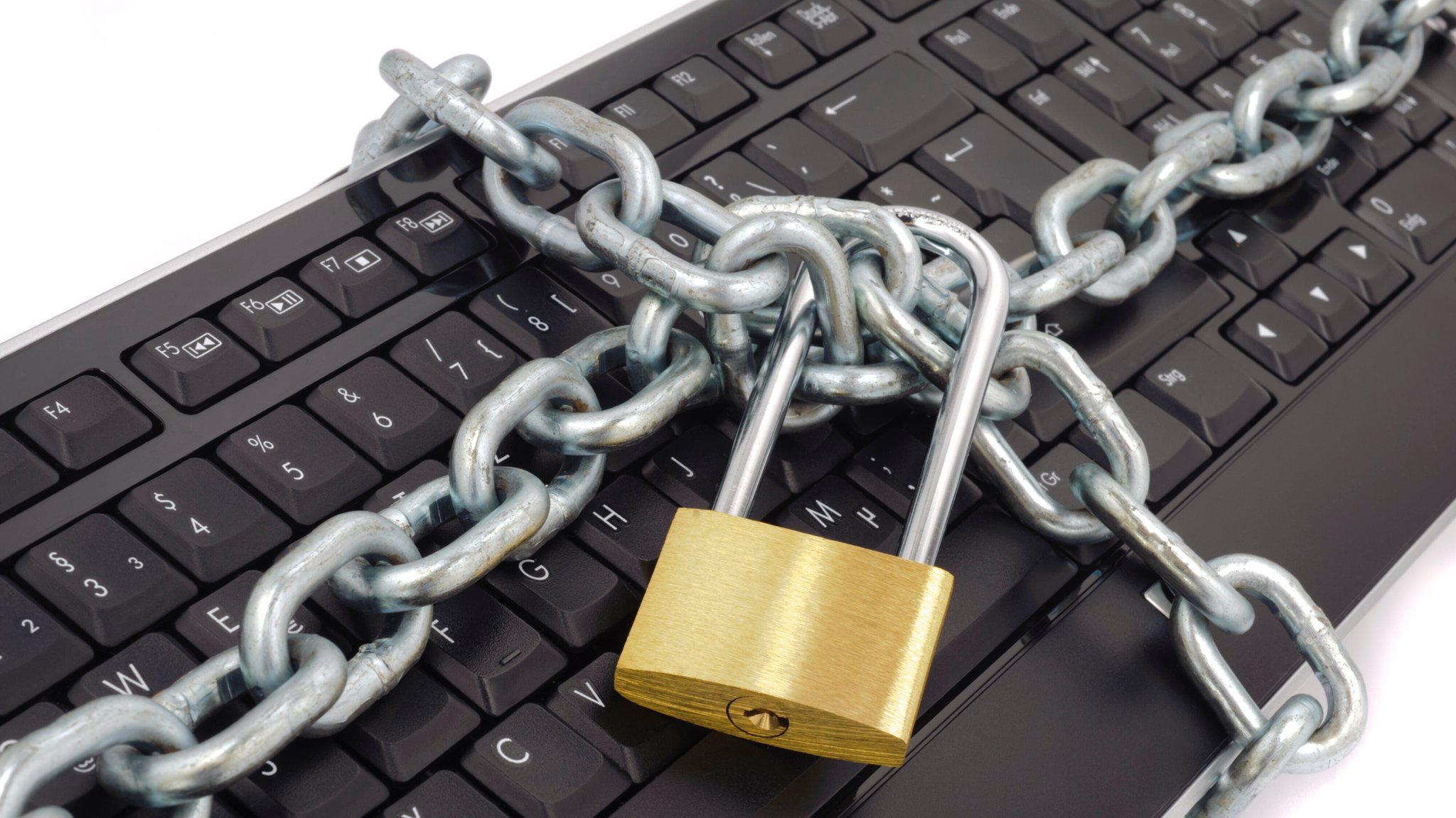 Computer Tastatur mit Eisenschloss - Symbolbild für Datenschutzpanne beim KVR | Bild: picture alliance / SZ Photo | Wolfgang Filser Computer Tastatur mit Eisenschloss - Symbolbild für Datenschutzpanne beim KVR