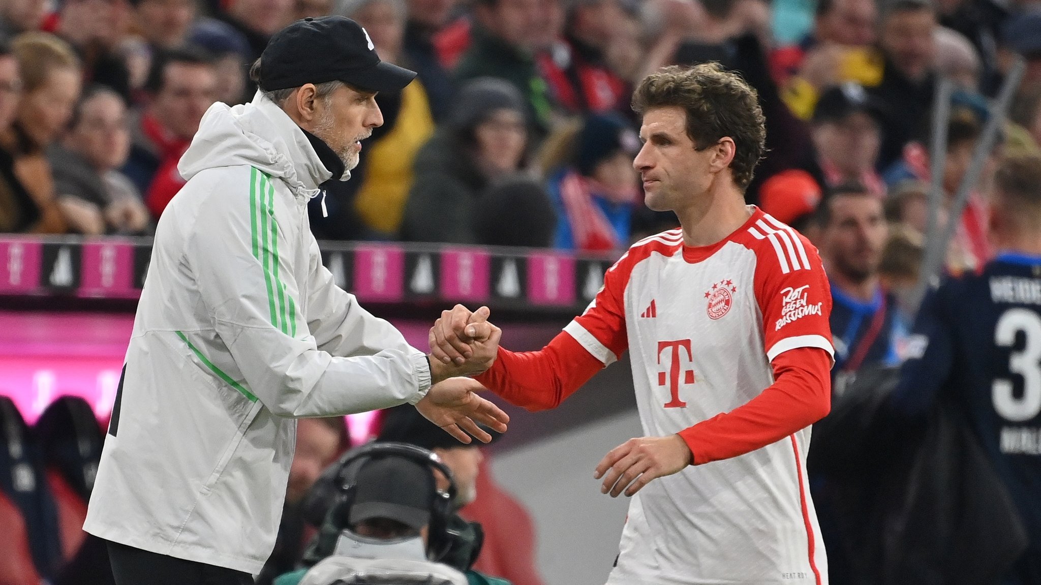 Thomas Tuchel und Thomas Müller