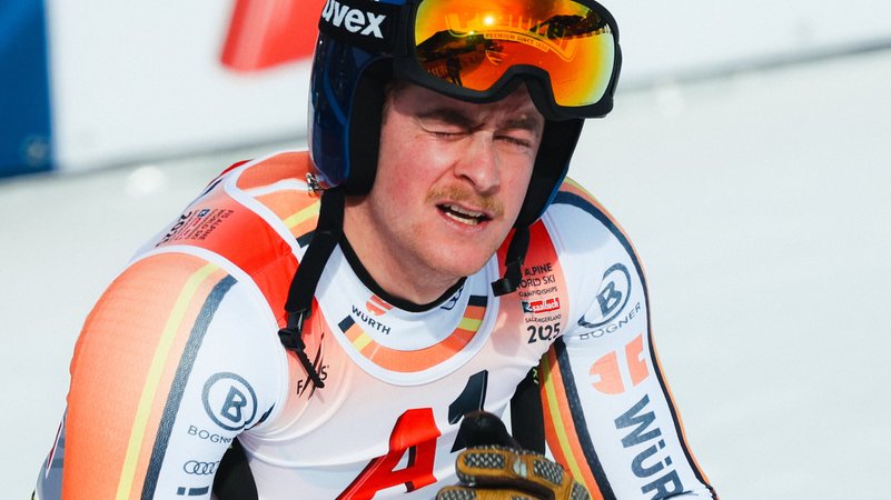 09.02.2025, Österreich, Saalbach-Hinterglemm: Ski alpin: Weltmeisterschaft, Abfahrt, Herren. Simon Jocher aus Deutschland reagiert im Zielbereich. | Bild: dpa-Bildfunk/Jens Büttner 09.02.2025, Österreich, Saalbach-Hinterglemm: Ski alpin: Weltmeisterschaft, Abfahrt, Herren. Simon Jocher aus Deutschland reagiert im Zielbereich.