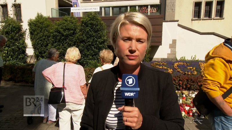 Bei dem Angriff in Solingen sind drei Menschen ums Leben gekommen, vier wurden schwer verletzt. Wie reagiert Solingen heute auf die Ereignisse? Eine Einschätzung liefert WDR-Reporterin Gina Niemeier. | Bild: BR Bei dem Angriff in Solingen sind drei Menschen ums Leben gekommen, vier wurden schwer verletzt. Wie reagiert Solingen heute auf die Ereignisse? Eine Einschätzung liefert WDR-Reporterin Gina Niemeier.