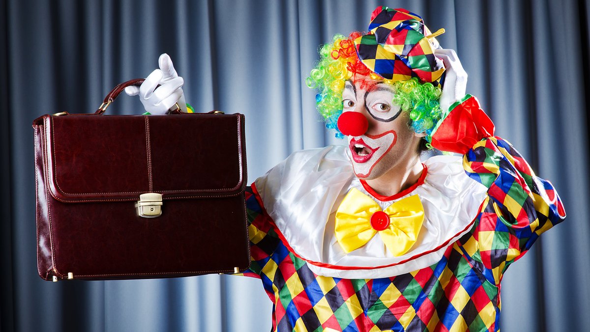 Clown mit Aktentasche