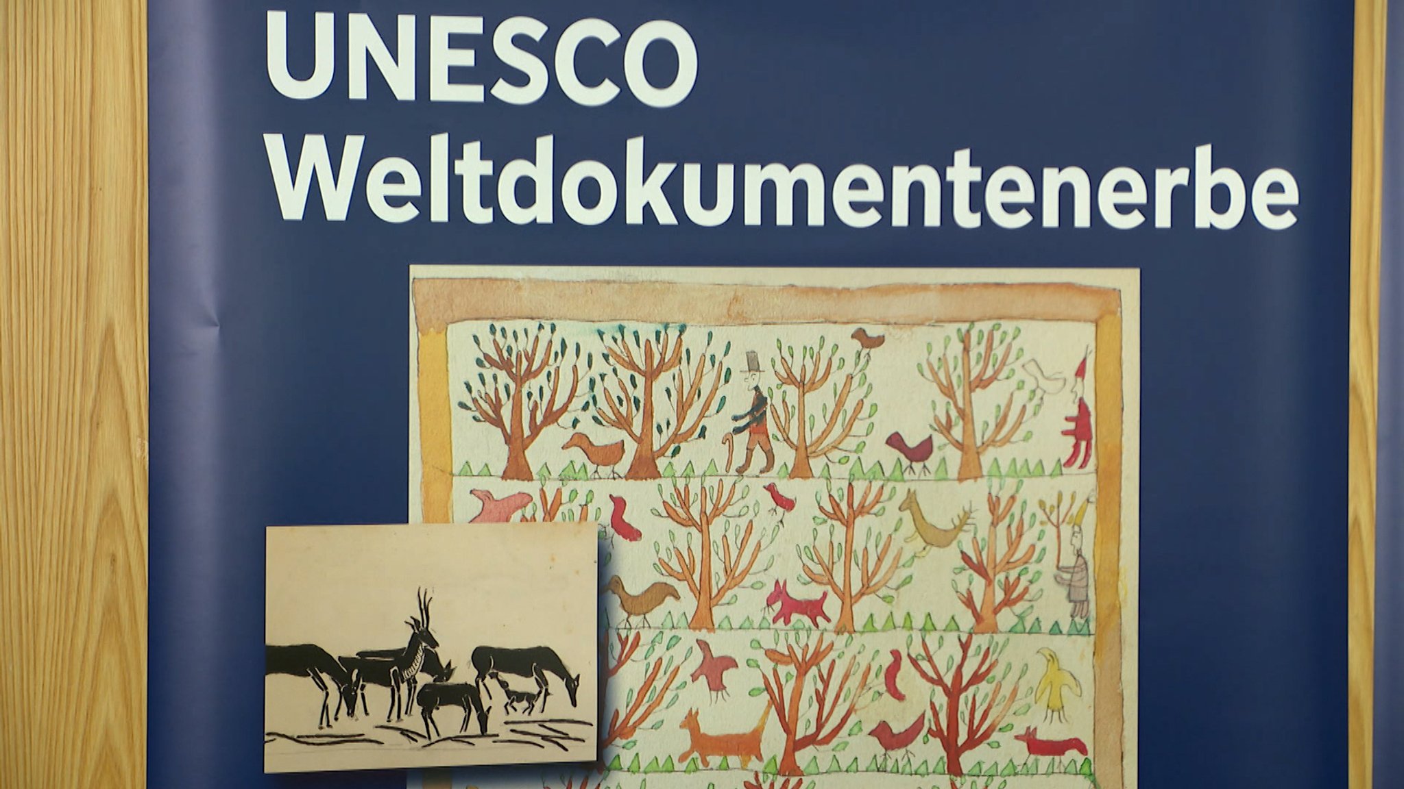 Zwei Kinderzeichnungen mit der Überschift "UNESCO Weltdokumenteerbe". | Bild: BR Zwei Kinderzeichnungen mit der Überschift "UNESCO Weltdokumenteerbe".