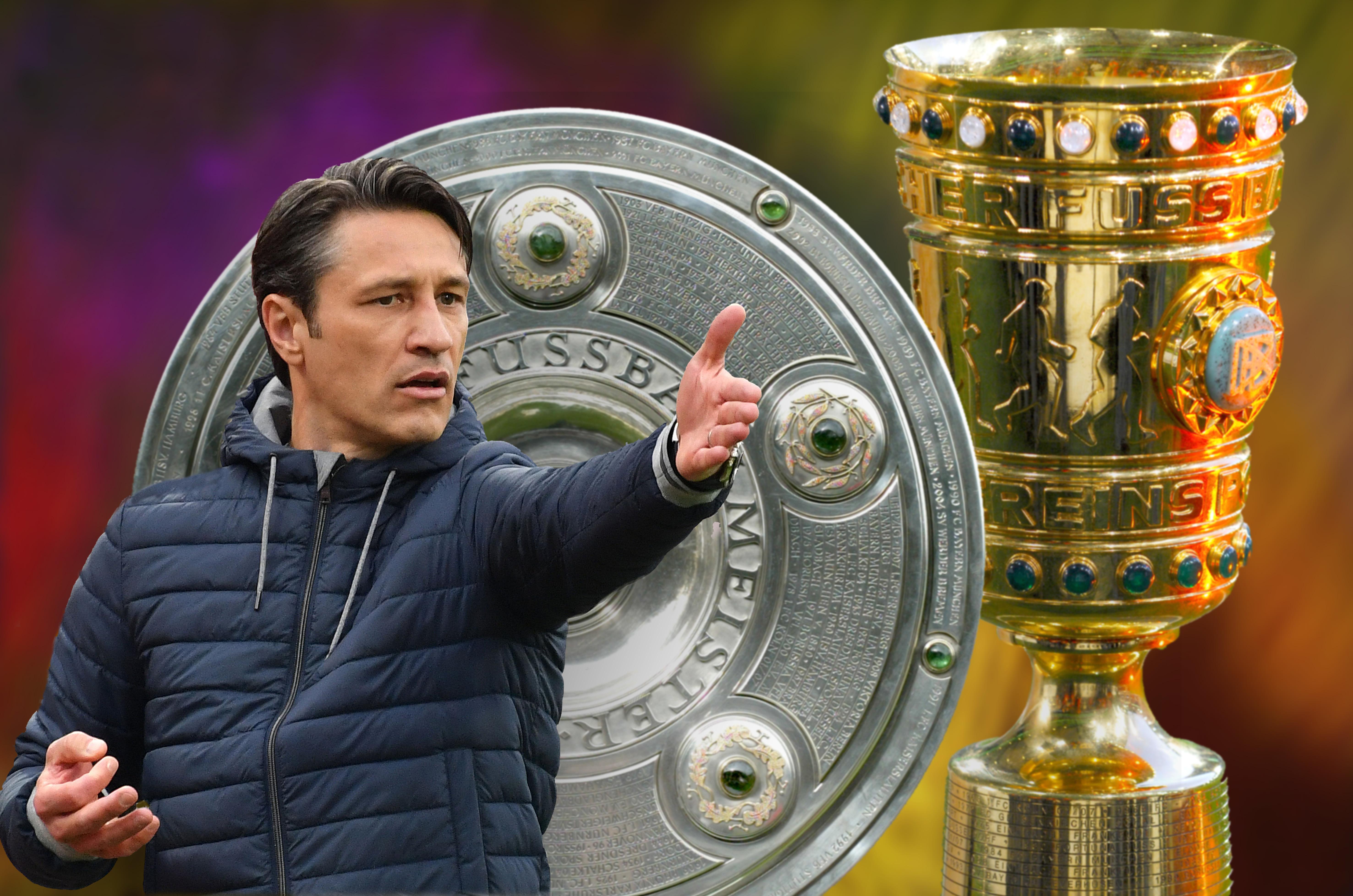 Niko Kovac vor der Meisterschale und DFB-Pokal | Bild: picture-alliance/dpa Niko Kovac vor der Meisterschale und DFB-Pokal