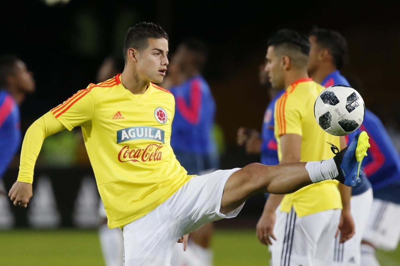 Football result. James Rodriguez holds Ball.