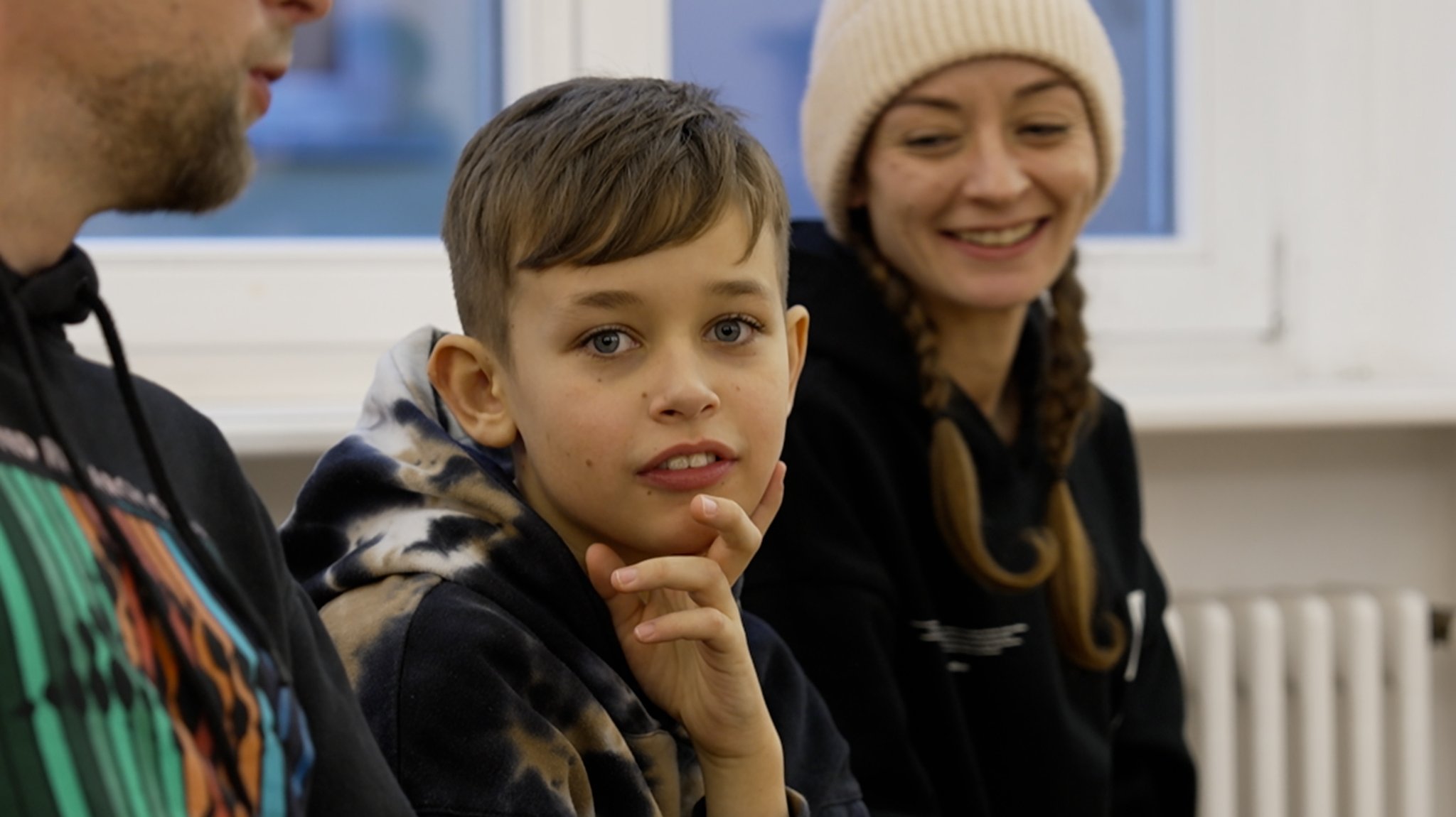 Jonathan mit seinem Vater und seiner Mutter beim Beatbox-Workshop