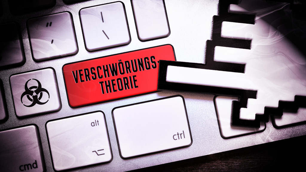 Eine Tastatur, auf der eine Taste mit "Verschwörungstheorie" beschriftet ist.