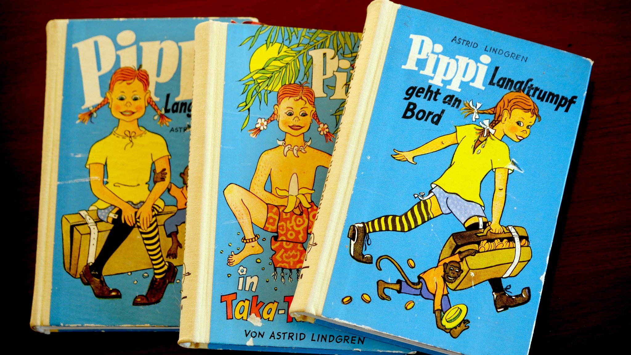 Drei "Pippi Langstrumpf"-Bände, sie stammen aus den Jahren 1960-1962. | Bild: picture alliance / Franz-Peter Tschauner Drei "Pippi Langstrumpf"-Bände, sie stammen aus den Jahren 1960-1962.