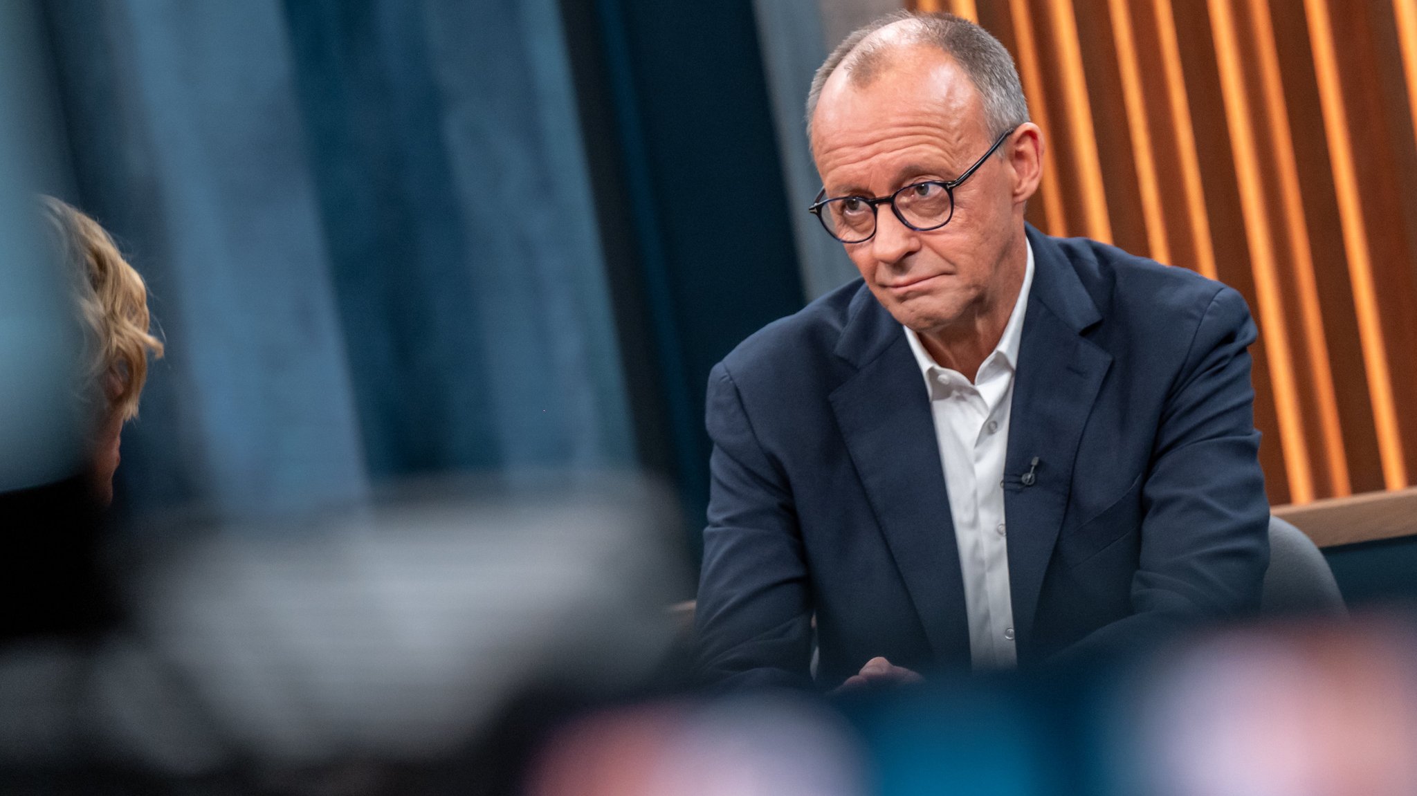 Bundeskanzler Friedrich Merz (CDU) spricht bei der ARD Polit-Talkshow "Caren Miosga".