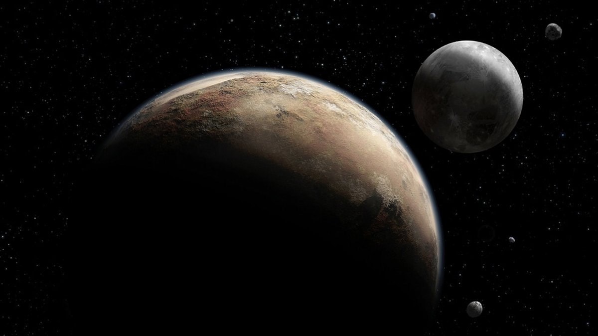 Pluto und seine Begleiter: Charon und die kleinen Monde